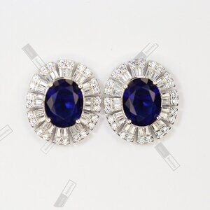 .925 Sterling Silver Oval Earrings with Sapphire-Tone CZ.
